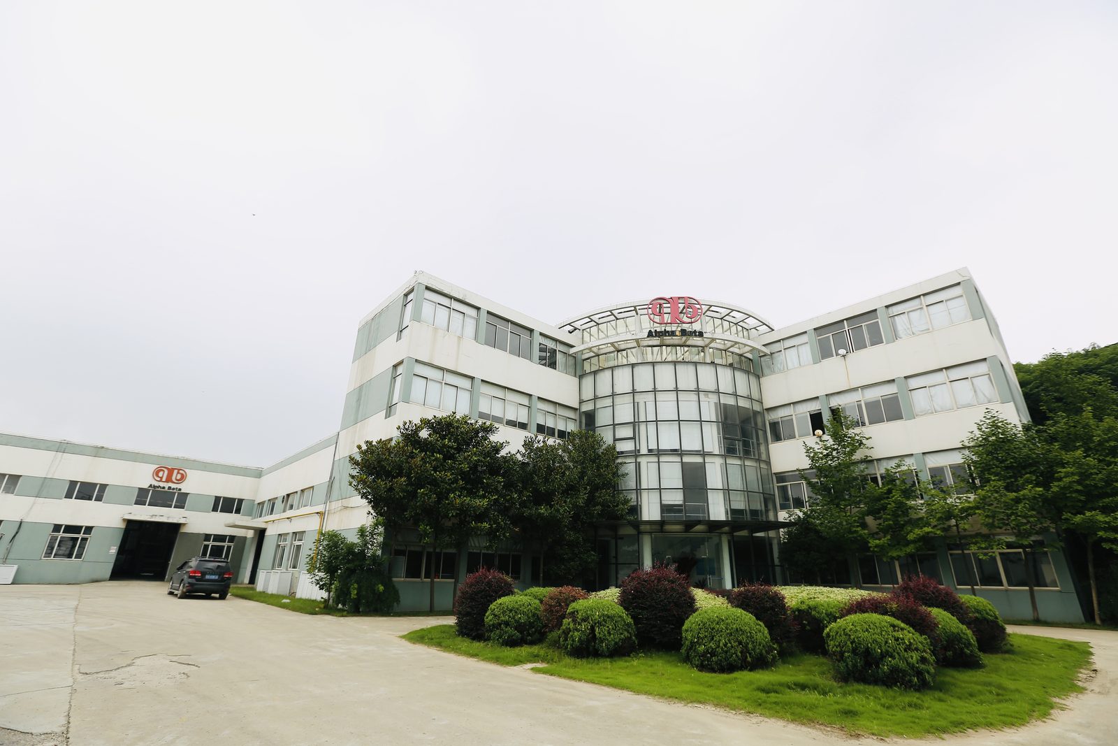 The founding Alpha Beta site in Nanjing with the rooftop logo