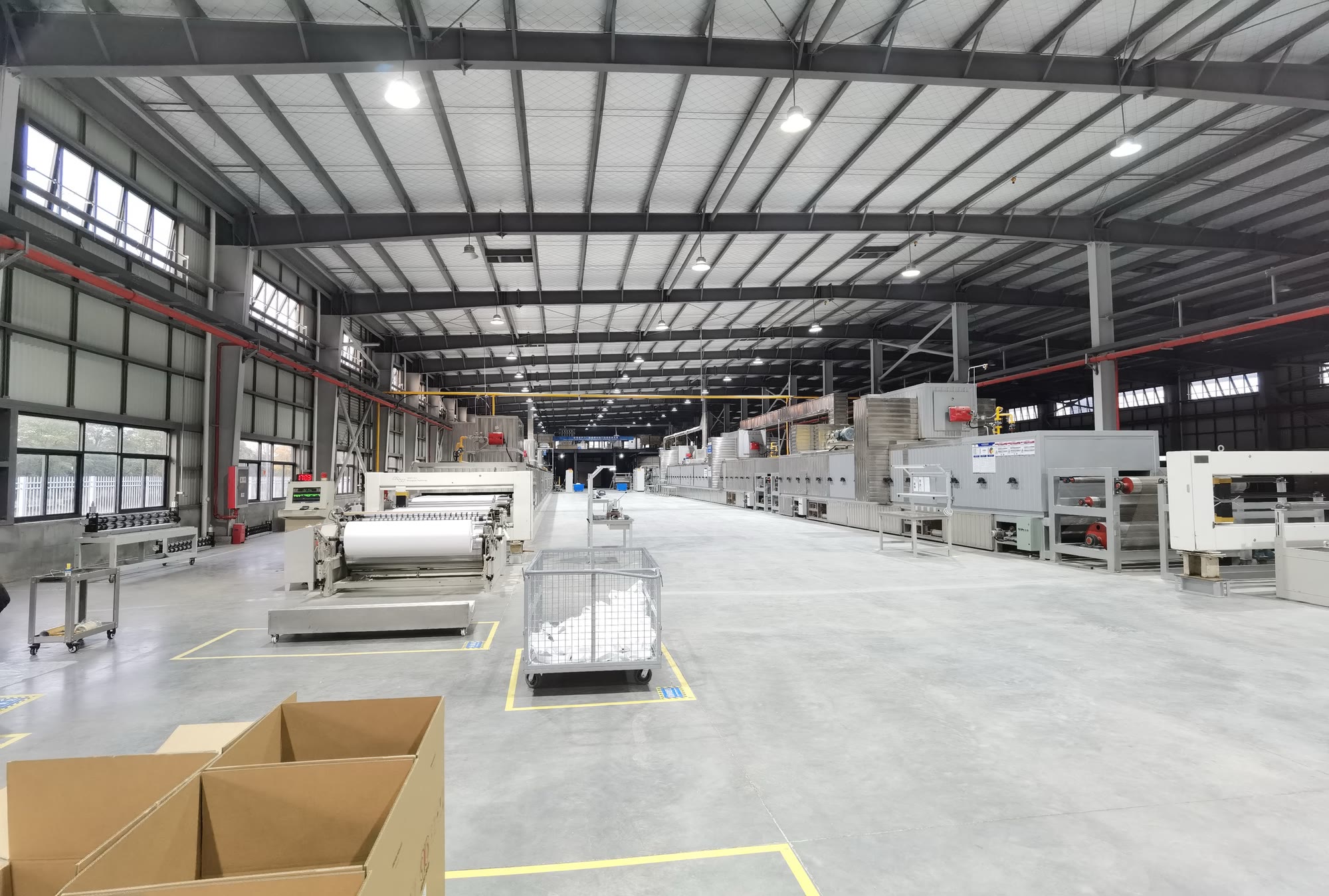 Wide view of an Alpha Beta separator production hall with automated lines