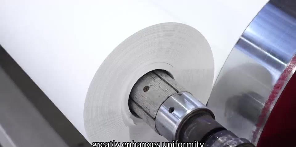 Jumbo roll winder with a white separator mother roll